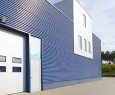 What is a sandwich panel in construction?